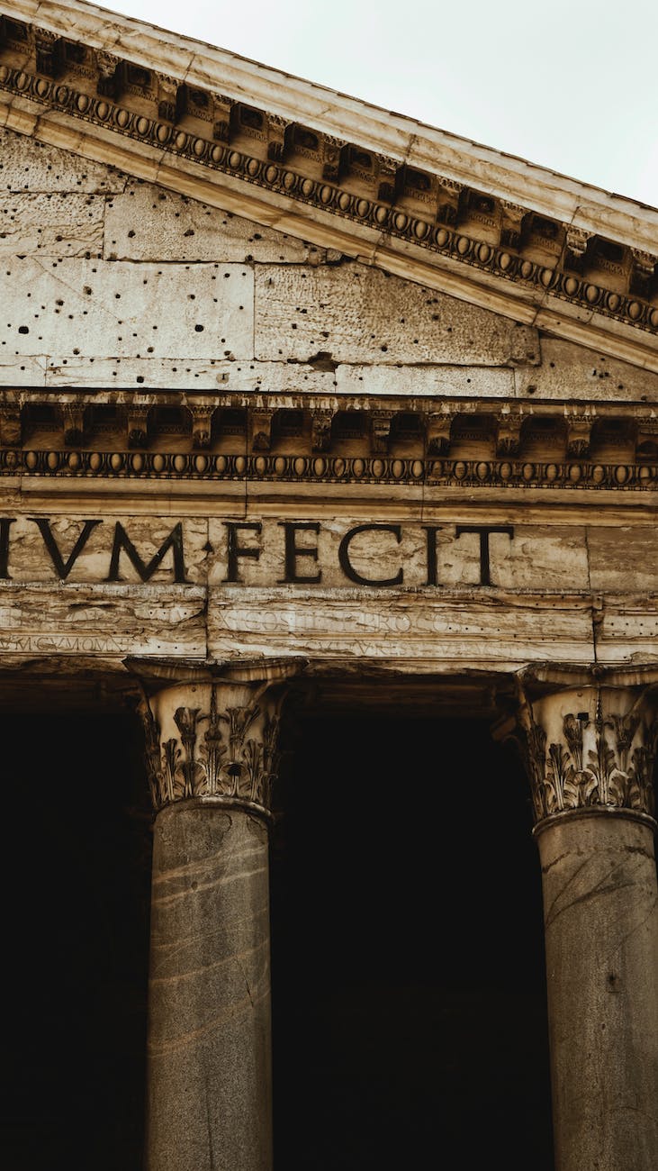 close up of the front facade of the pantheon in rome italy