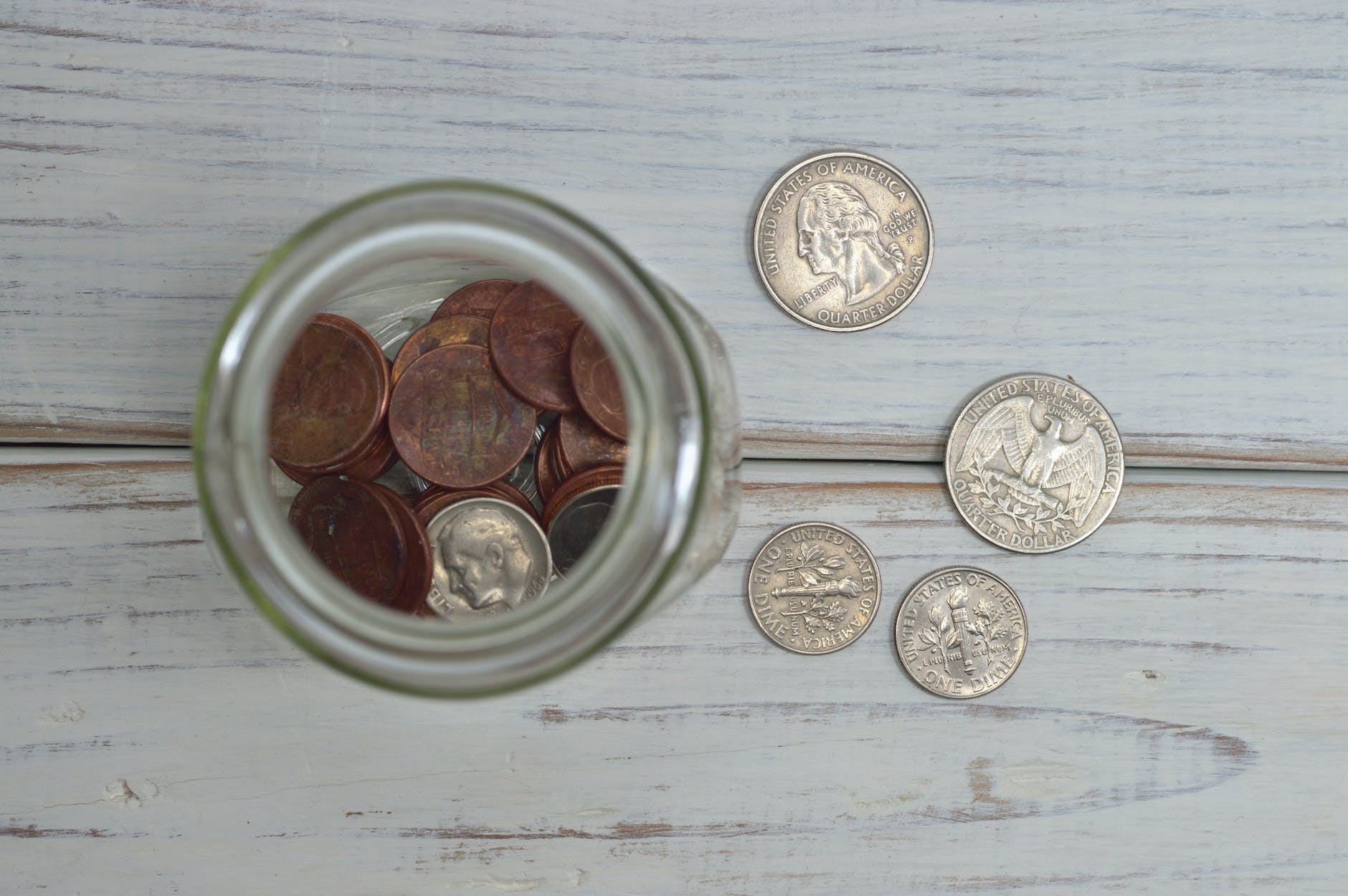 coins inside jar